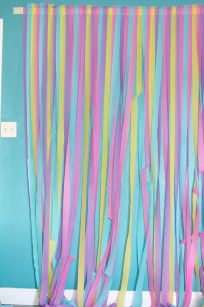 Here is a quick and cheap way to transform a wall into a back drop. There are so many different color options that are sure to fit any party you are hosting! 