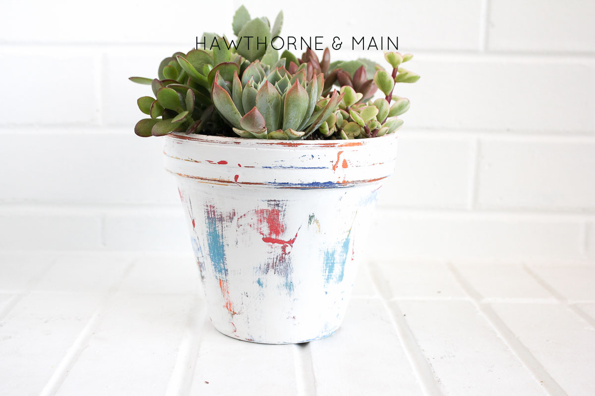 Check out this easy way to get a worn look on a flower pot. It looks like it was harder than it really was.  Come learn the splotchy paint technique.  