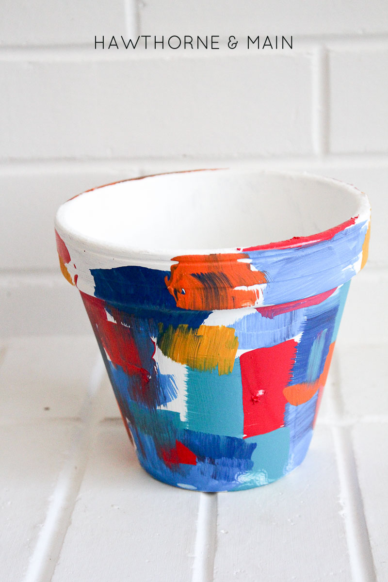 Check out this easy way to get a worn look on a flower pot. It looks like it was harder than it really was.  Come learn the splotchy paint technique.  