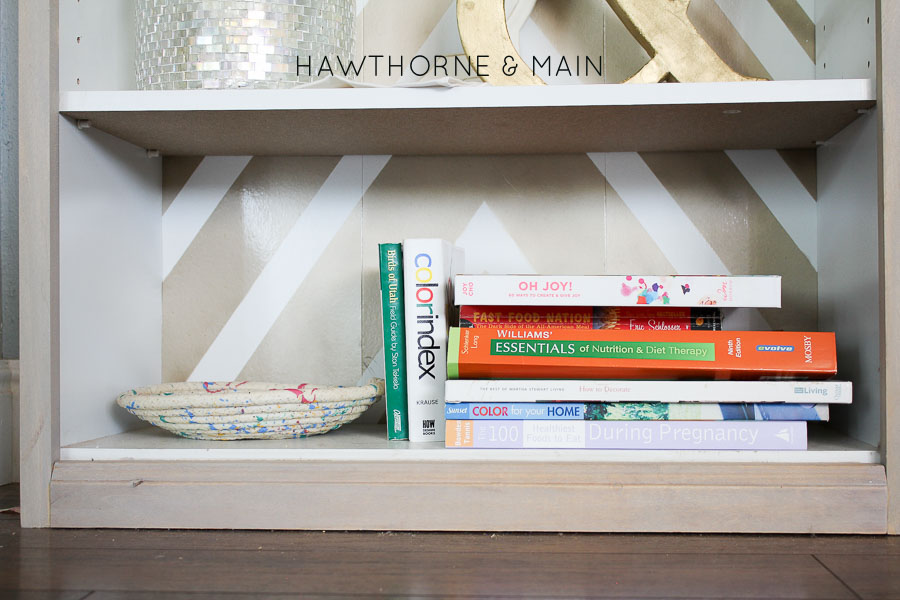 Check out this super easy Target bookshelf hack! I totally could do this! Plus I love the look of the light wood! Such a pretty piece! 