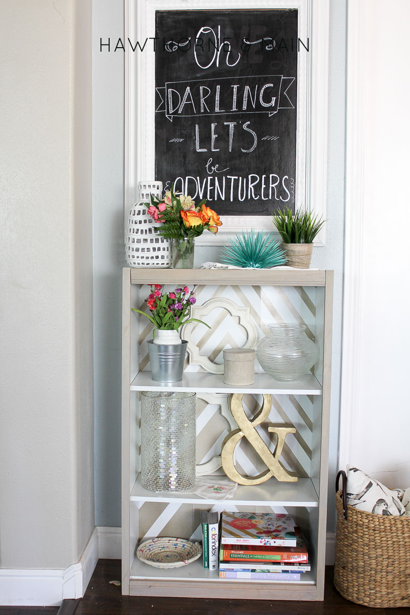 Check out this super easy Target bookshelf hack! I totally could do this! Plus I love the look of the light wood! Such a pretty piece! 