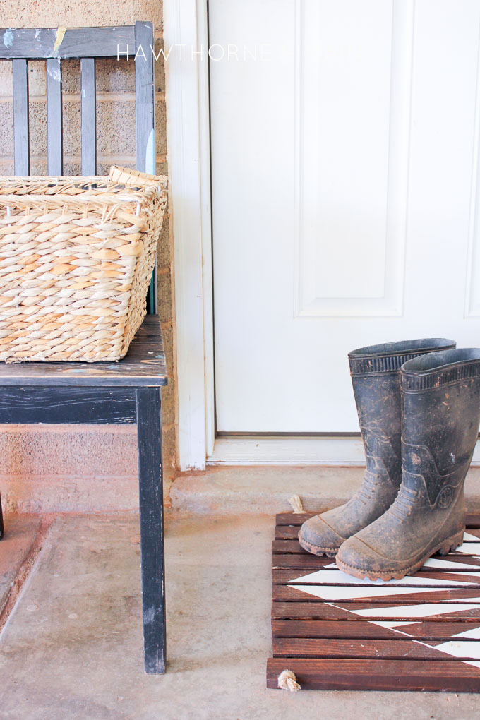 Check out this simple wood slat door mat! I love the geometric pattern that she added to it. This really would be so fun to make for our side entry to help with dirt! 