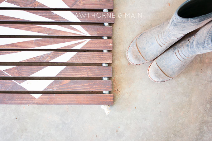 Check out this simple wood slat door mat! I love the geometric pattern that she added to it. This really would be so fun to make for our side entry to help with dirt! 