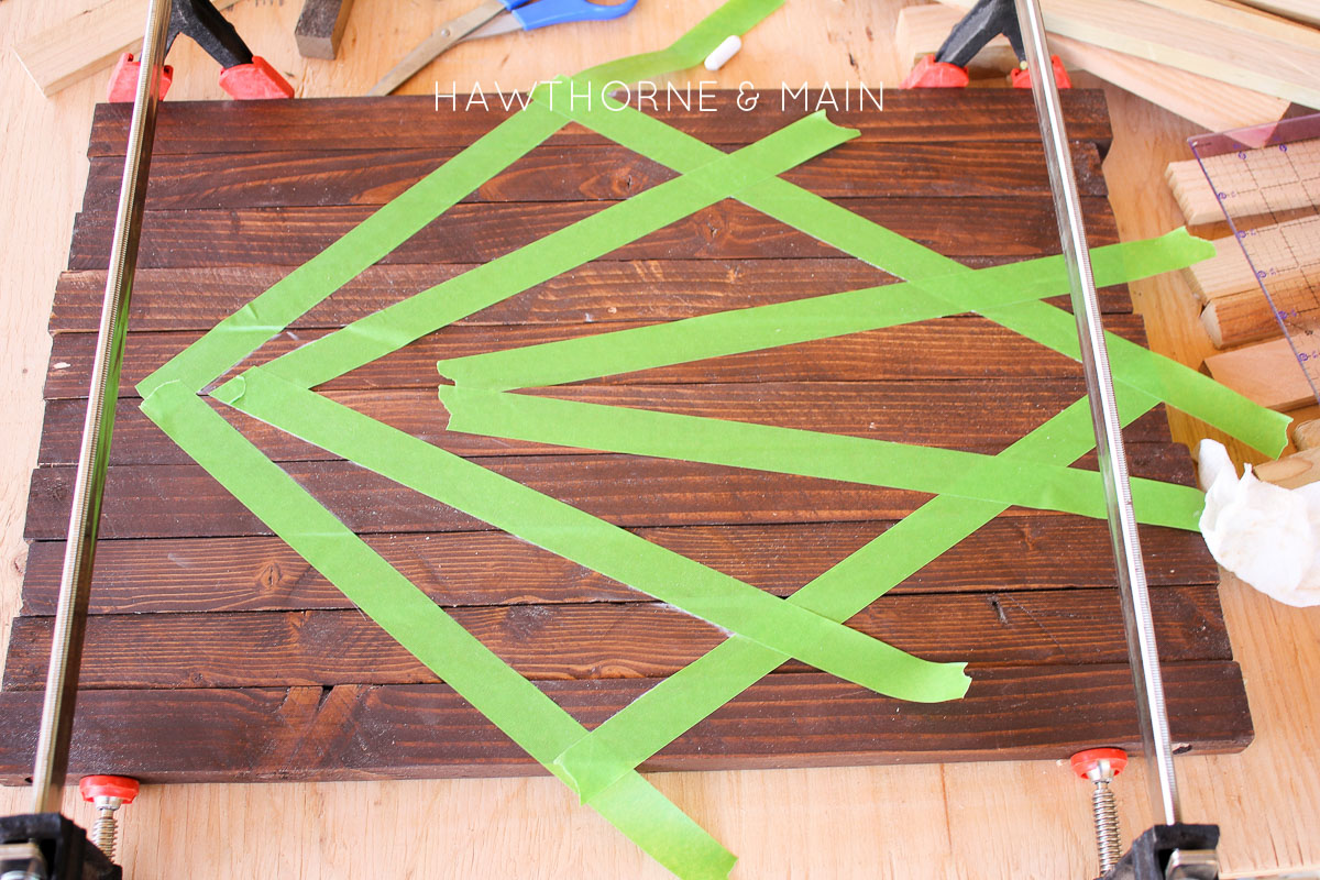 Check out this simple wood slat door mat! I love the geometric pattern that she added to it. This really would be so fun to make for our side entry to help with dirt! 