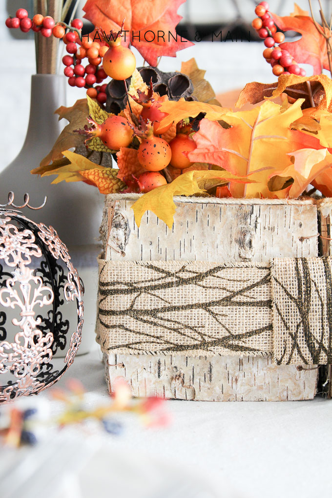 Fall Centerpiece with Burlap Ribbon An easy and quick autumn decor piece to add to your table.
