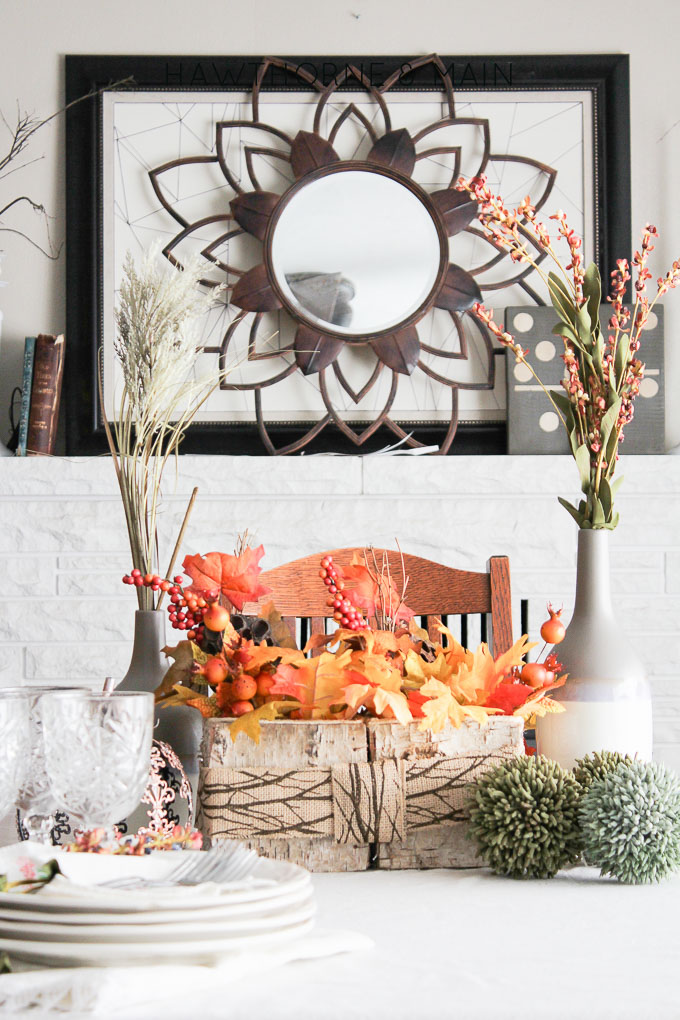 Fall is in the air, or will be soon! Here is a woodsy fall centerpiece piece that is the perfect mix of rustic with a tradition fall feel.  I love the aspen box!