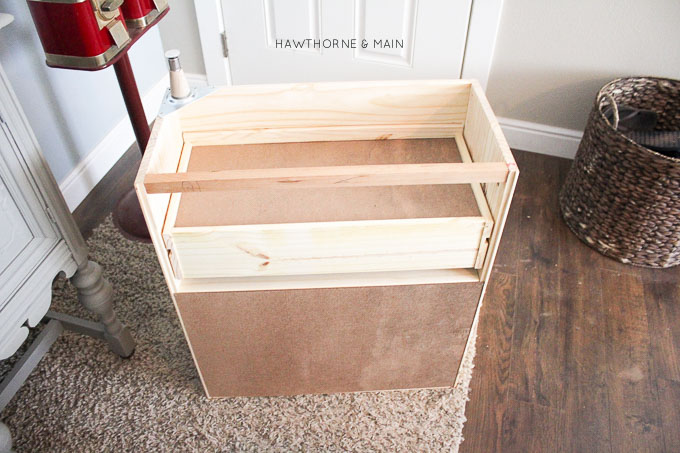 Love this IKEA RAST hack. All you need are a few supplies to make over this cheap ikea dresser into a sleek modern mid century dresser or night stand. 