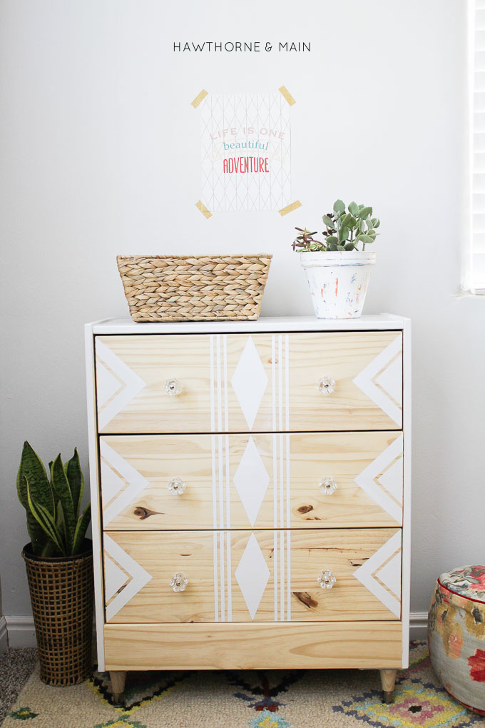 Love this IKEA RAST hack. All you need are a few supplies to make over this cheap ikea dresser into a sleek modern mid century dresser or night stand. 