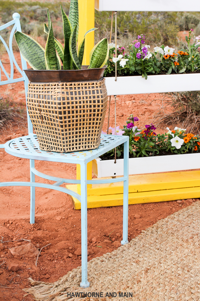 DIY Hanging Gutter Planter. This is a really fun and easy afternoon project that is sure to brighten up your outdoor space. 