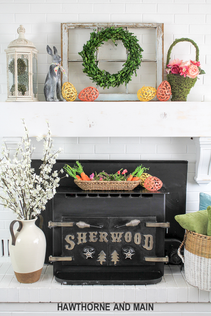 Spring Refresh with Easter Accents. This mantel is the perfect mix of spring and easter. I love pops of color and the pretty styling! 