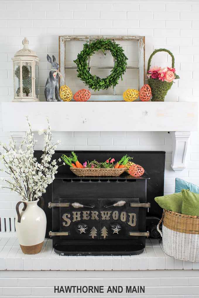 Spring Refresh with Easter Accents. This mantel is the perfect mix of spring and easter. I love pops of color and the pretty styling! 