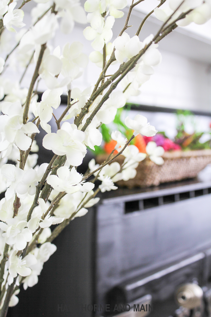 Spring Refresh with Easter Accents. This mantel is the perfect mix of spring and easter. I love pops of color and the pretty styling! 