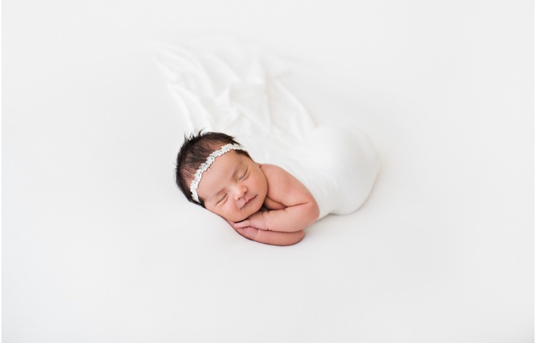 A few of our newest addition. Her newborn baby photos turned out so cute. I cannot decide which is my favorite. So many good ones! 