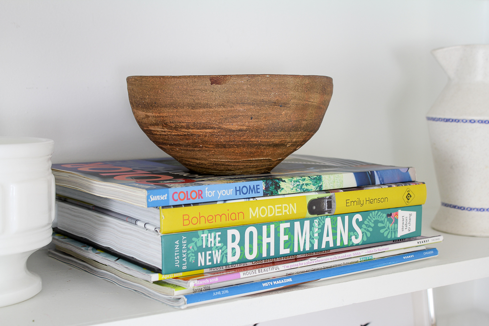 Love the styling on this built in bookcase. Love the bright and fun colors. Such great inspiration for my bookcase. Pinning for later!