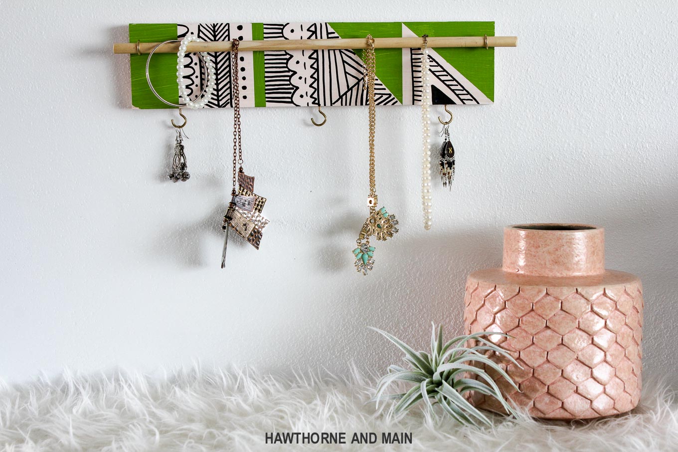 Loving this cute DIY jewelry holder. It looks like it is so easy to make with just a few supplies. 