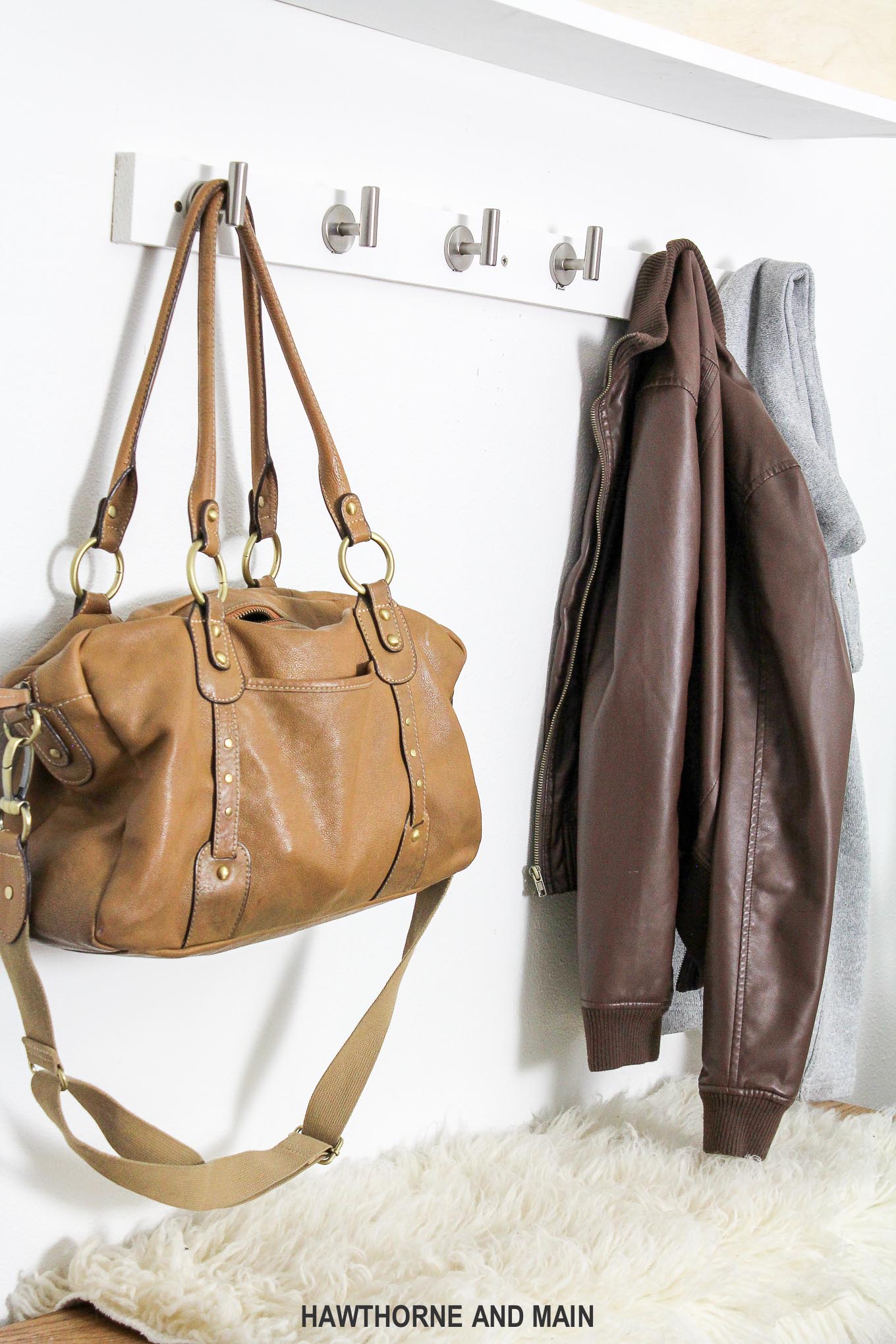 Learn how to make an inviting entryway with this simple diy coat rack